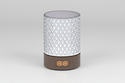 Decorative lamp with digital display on a white background